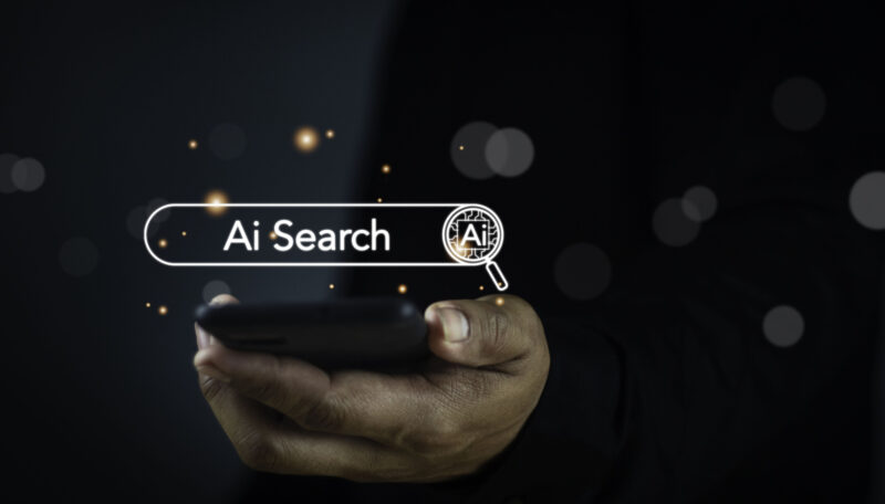 AI searching concept. Data search optimization by artificial intelligence technology. Search engine bar with blank space for text and AI button appear while business person typing on laptop computer AI search which is now used for answer engine optimization