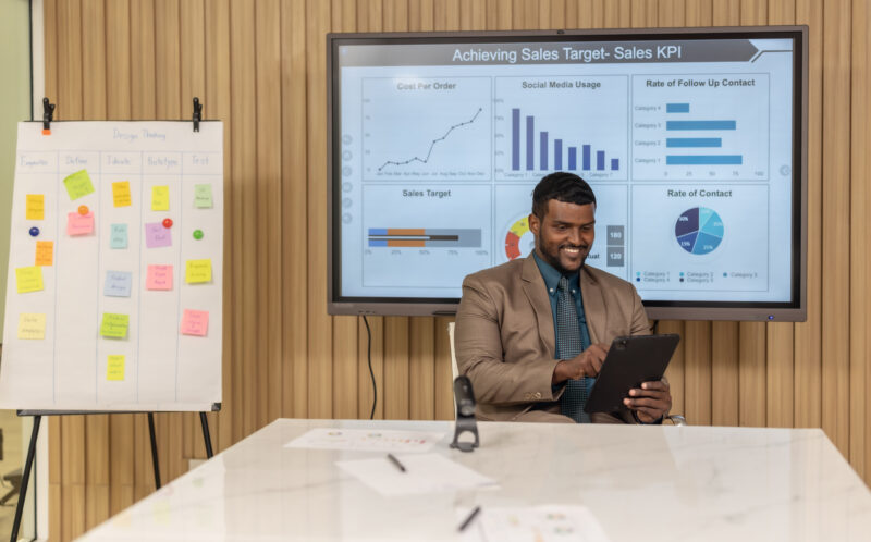 Confident man leads, showcasing leadership, strategic thinking, sales representative using agentic ai for sales prospecting