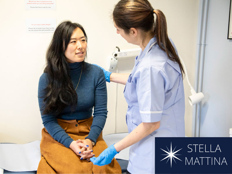 nurse talking to patient to illustrate PCOS vs. endometriosis diagnosis